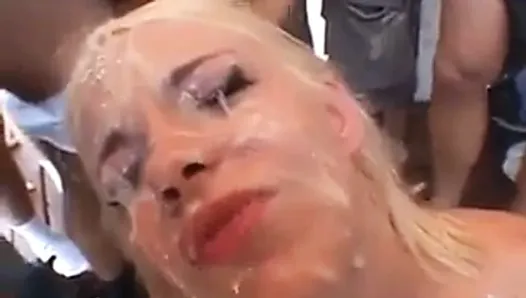 Blonde Takes Dozens Of Facial Cumshots