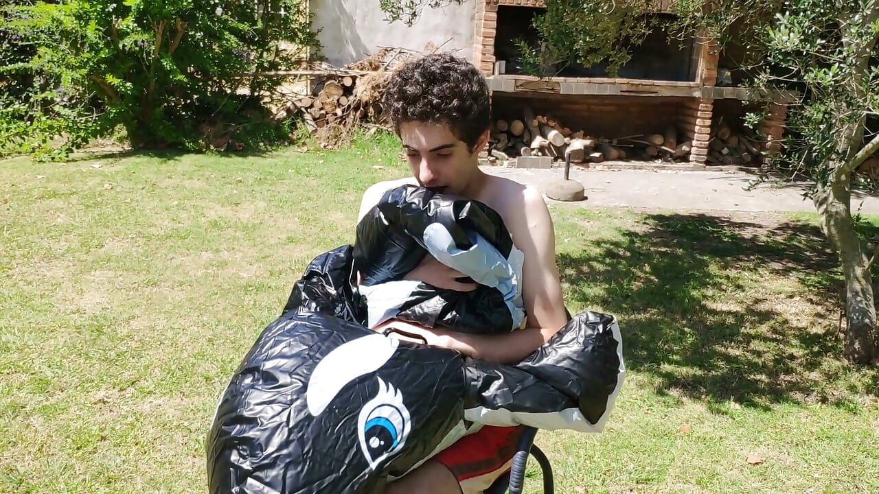 Beautiful Man Inflates His Inflatable Whale Near Pool Outside