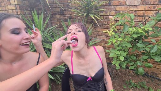 Two garden brunette whores using each other as human ashtrays