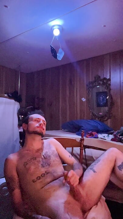 Tattoo stud playing with his cock