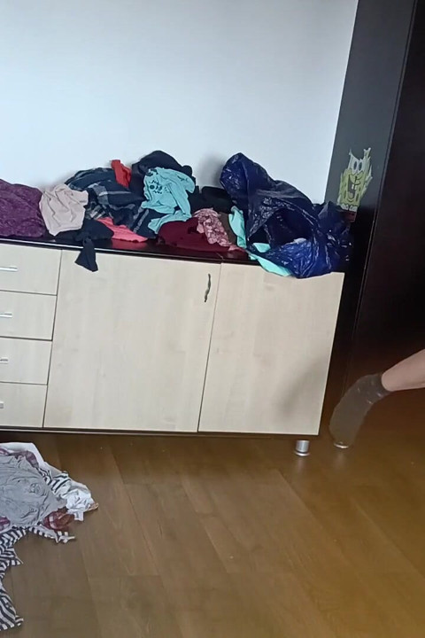 Amateur Woman Has Fun Trying on Clothes and Cutting Them