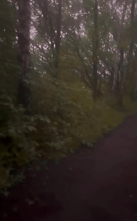 Long naked barefoot walk from car to a welcome to my town sign