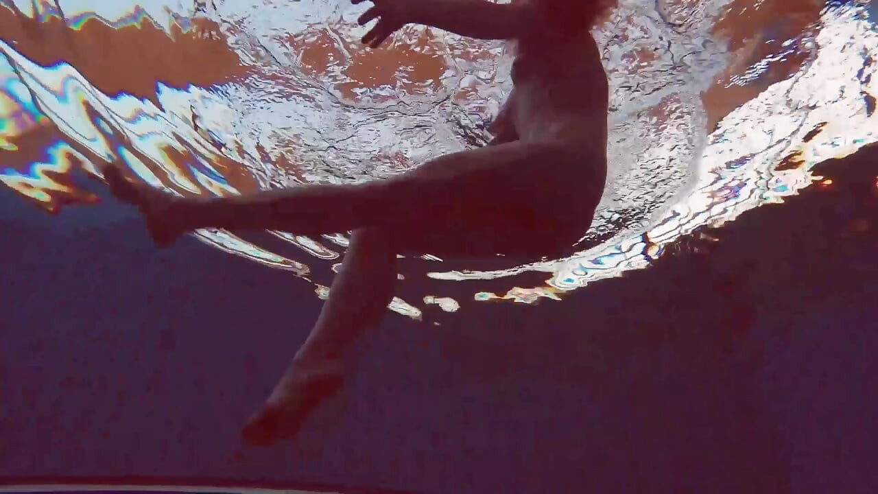 Pretty Polish teen Alice swimming without clothes on