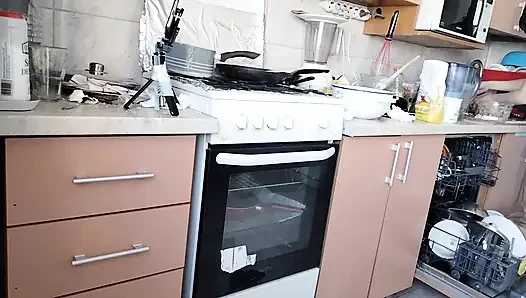 Sexy wife prepares lunch naked in the kitchen.