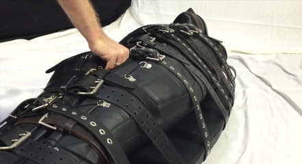 Bound with 20 belts and made to cum in a leather s