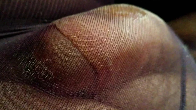 Self fondling through nylon with precum