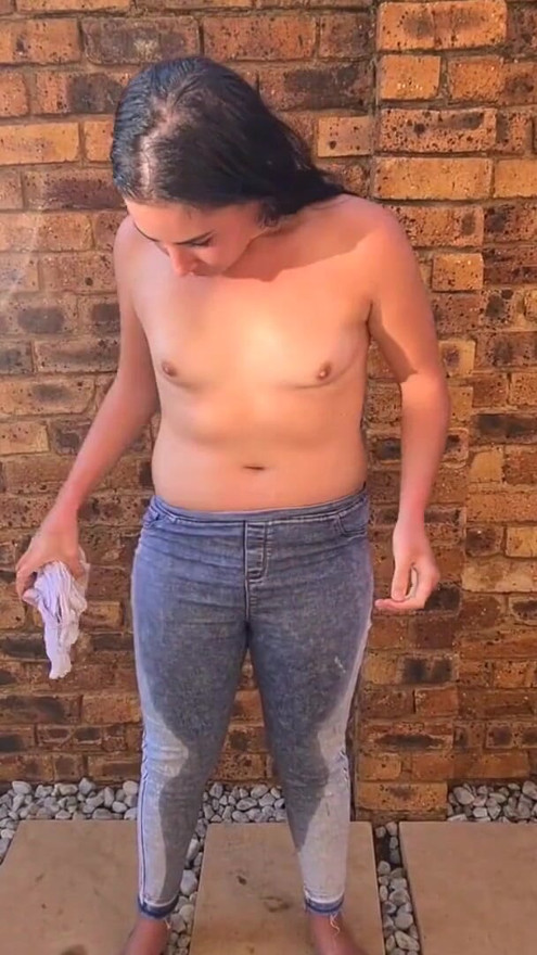 Brunettes outdoor piss, soaking clothes in piss, pants wetting | Clip 1