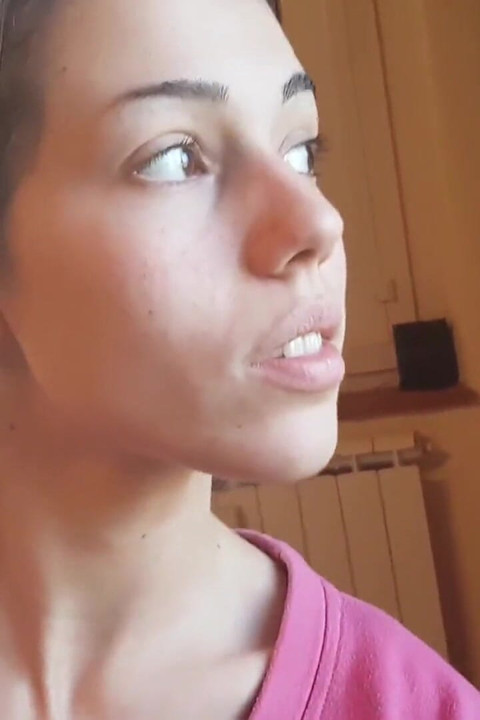Tempting Italian girl smokes a cigar in a close up video