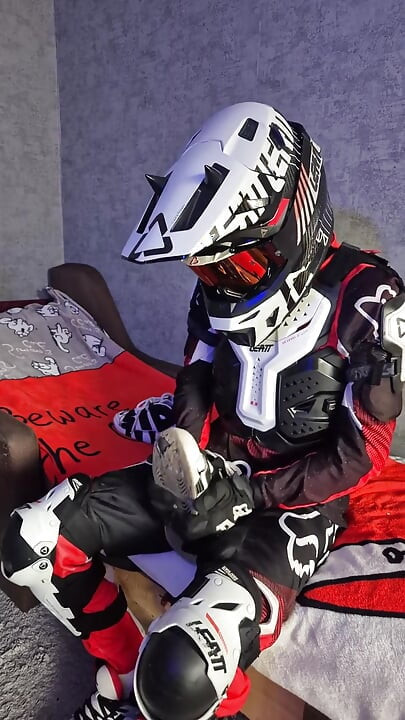 An Excited Guy in Motorcycle Gear Fucks His Sneakers