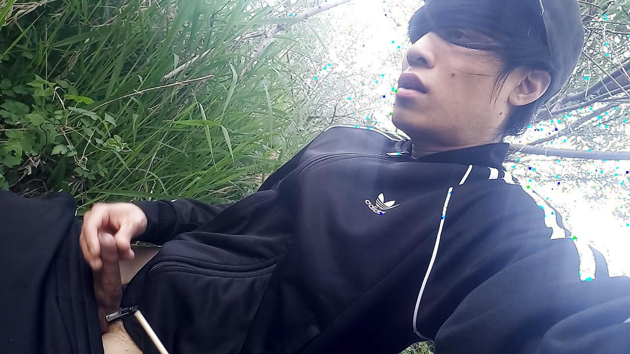 Gay boy Jon Arteen, wearing adidas tracksuit Campus sneakers, gets a hard-on outdoors, jerks off, squirts big cumshots before cl