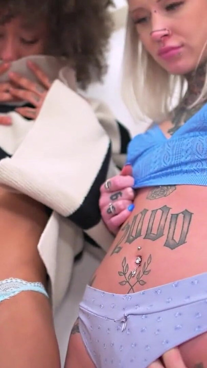 Stunning moment from "Inked Gurlz - A Ebony Black Babe and her Blonde BFF is Fucked in the Ass Anal"
