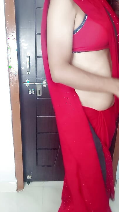 Indian hot stepmom wearing sexy red bra and satin saree