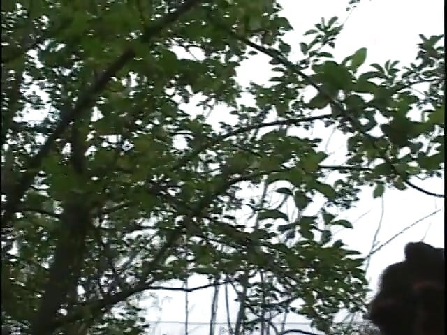 Mature woman gets a younger woman naked outside and fingers her cunt
