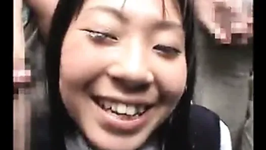 Japanese girl receives a bukkake  in public