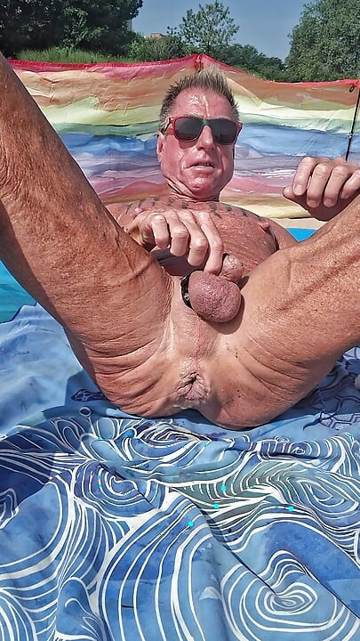 Early morning at the beach stretching of my asshole with my huge black dildo