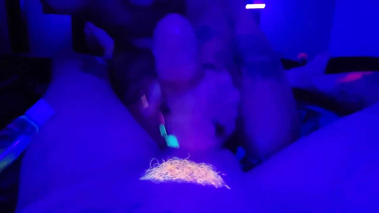 Blacklight goth girl with neon hair edges big dick with crazy massage gun toy gets huge cumshot
