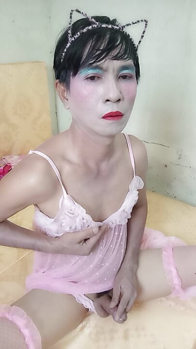 Oanh Le transgender wearing a sexy robe masturbating happily