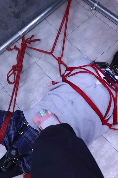 The Lovely Girlfriend Is Bound by Gloves, a Collar, and a Gag