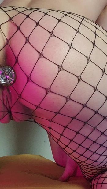 Playing with my buttplug in fishnets