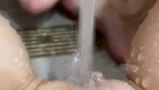 Oh she loves to masturbate with a stream of water until she orgasms