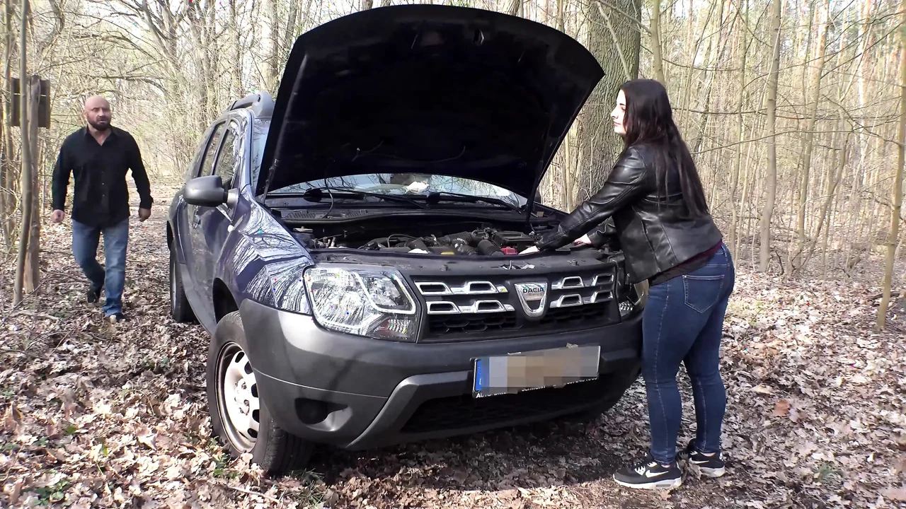 She sucks his cock and he helps her about the car