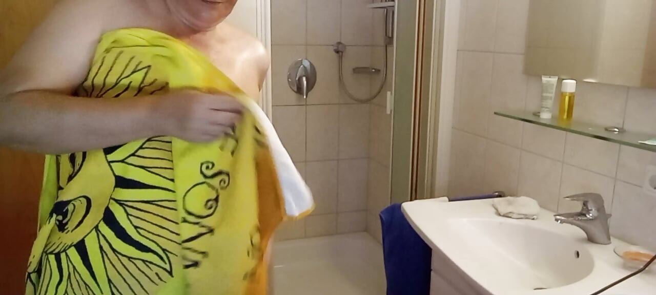German BBW MILF 53 oils her soft fat body after showering