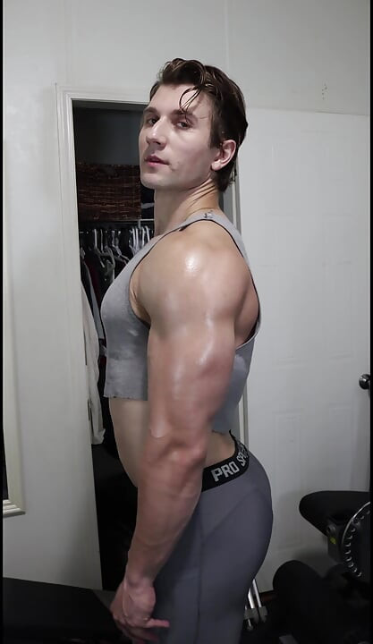 Adonis Beautiful Bodybuilder Boy Poses and Tries to Get You Workout