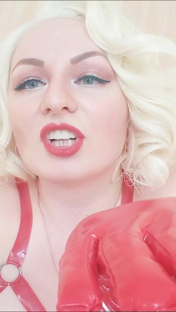Emotional moment from "Strap-on POV video: topless Mistress in thigh high over knee boots with long gloves - Arya Grander"