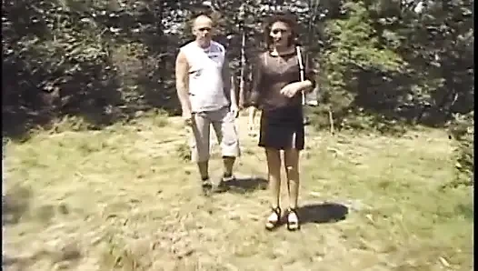 Bisexual stud gets his ass fucked by a dude while fucking a brunette babe on the grass