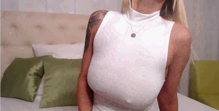 Nice  blonde girl show her big tits