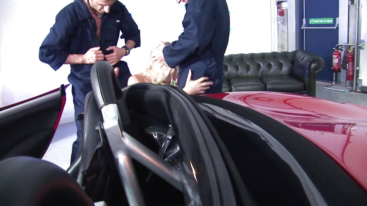 Hot blonde mature slut in a threesome by the car