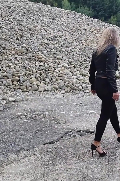 Grandma Is Walking Around a Gravel Pit in Tight Leggings and High Heels!
