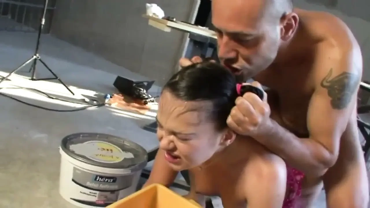 A teenager is hardcore banged by a man breaking her ass hole