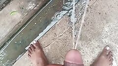 Indian cute boy showing his big cock and pissing