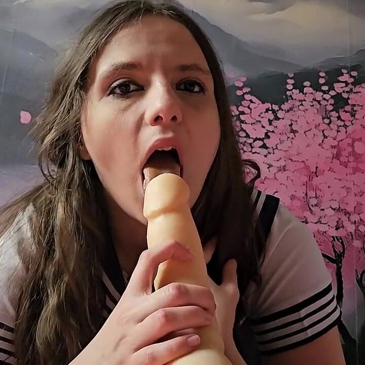 Japanese Girl Getting Fucked by a Torso with Silicone Cock