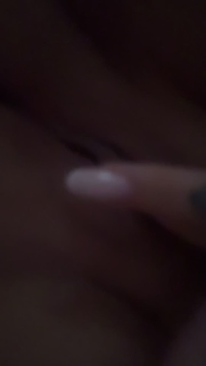 Masturbating