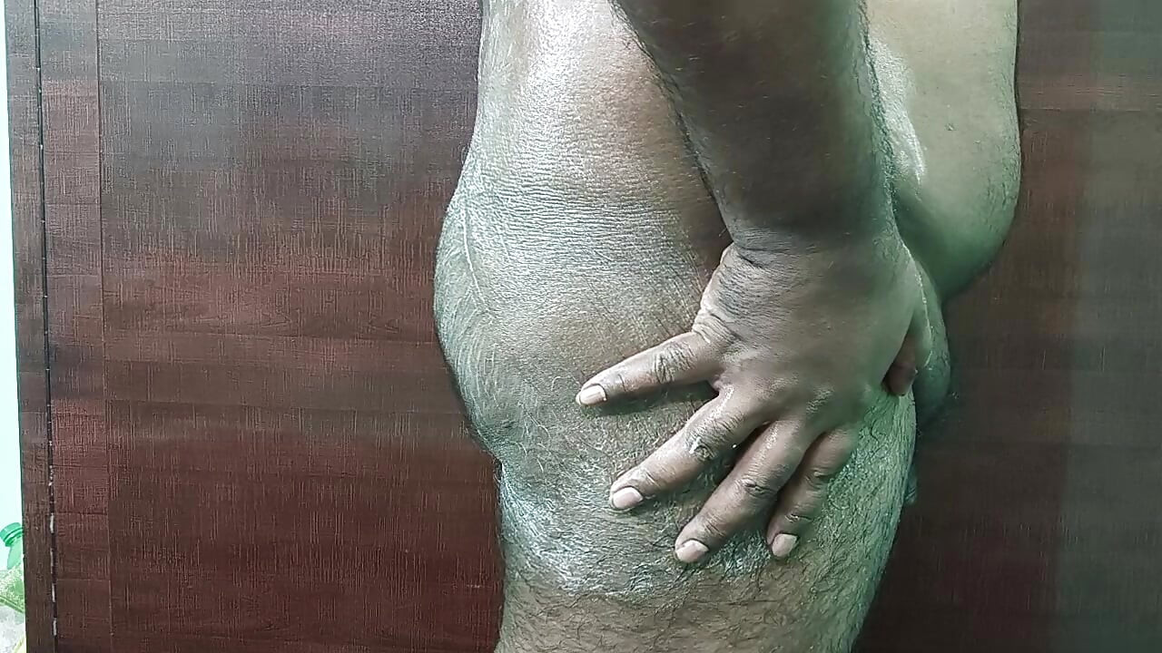 On ass applying white cream