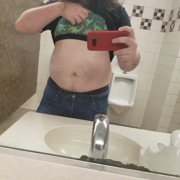 Showing off my bra and clamps in a public bathroom