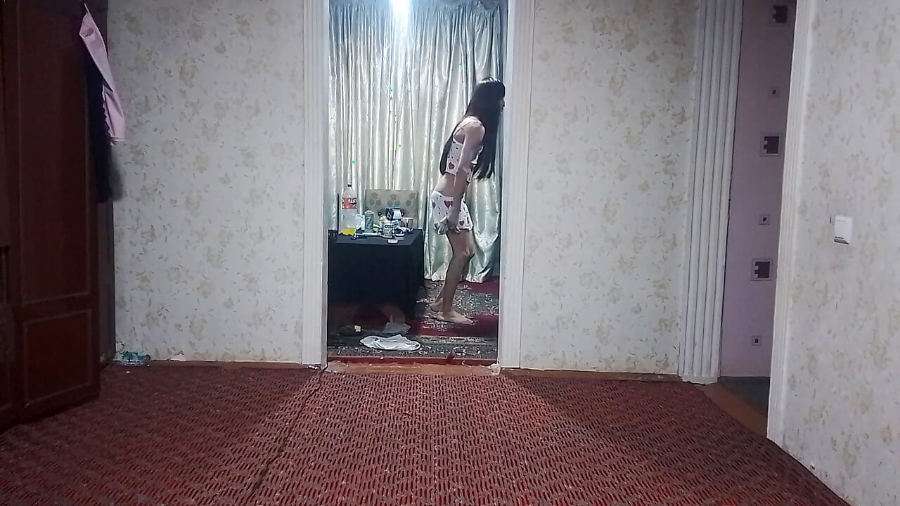 Crossdessor cleaning his house