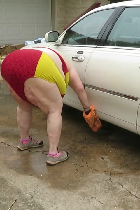Sexy Mature bbw redhead  Nurse Vicki washes her car!