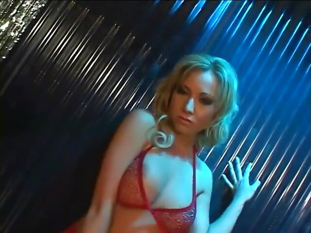 Gorgeous busty beauty in red outfit rides sex-machine at the strip club by demand of special guest