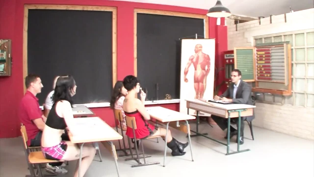 Brunette teen penetrated on the college desk by the teacher