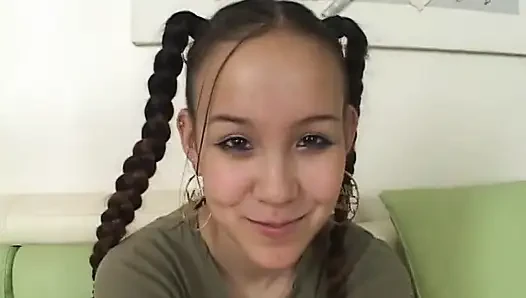 Beautiful young asian girl with braces and pigtails sucks cock pov style