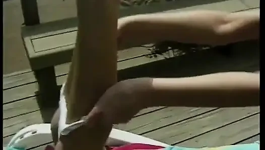 Hot babe squeezes her tits while her girlfriend eats her out