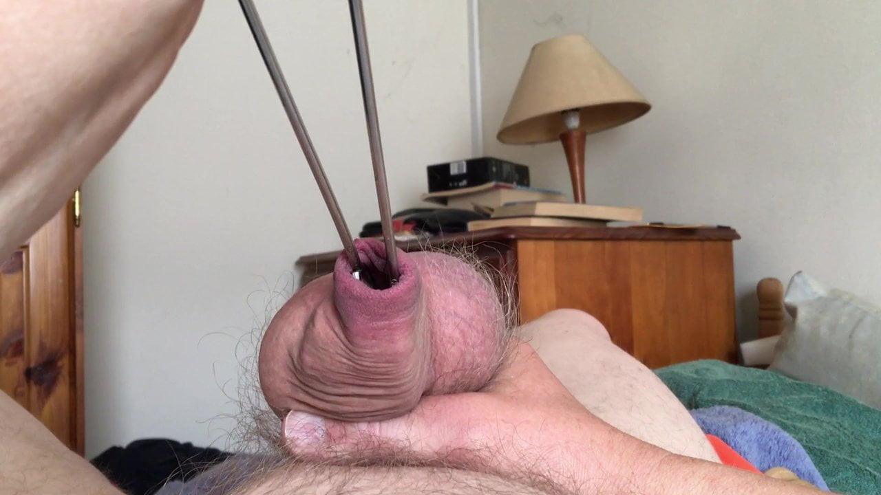 Foreskin with barbecue tongs