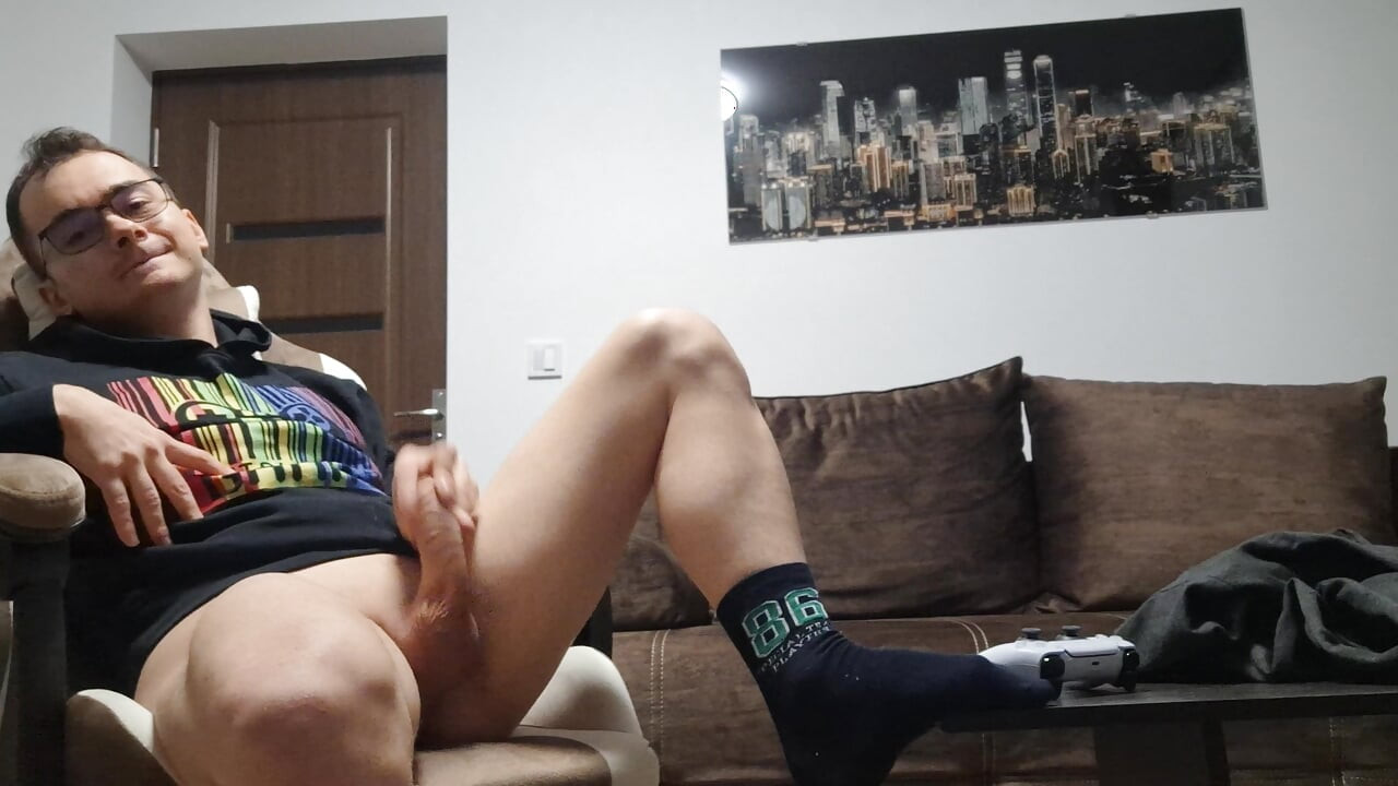 Horny nerd gets home from college and jerks off while playing the Playstation