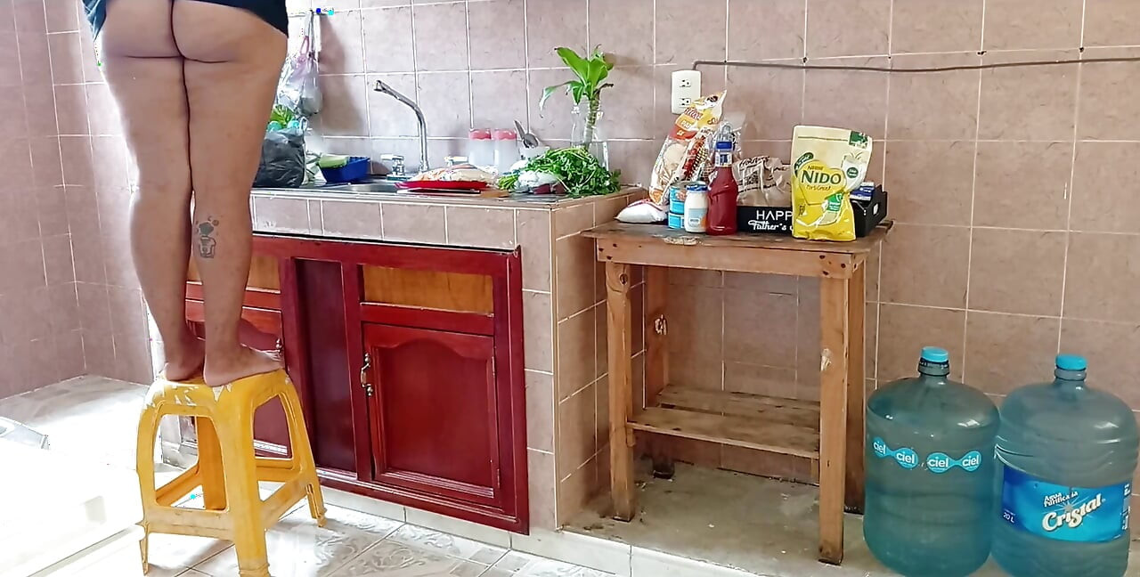 Chubby Stepmother Washes and Cleans the Kitchen