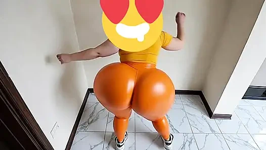 Frau mit dicken hintern in orange leggings bewegt sich