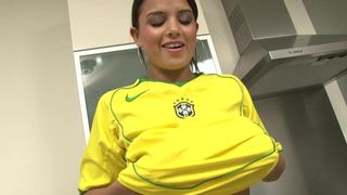 Sporty slut maturbates with a vibrator in the kitchen