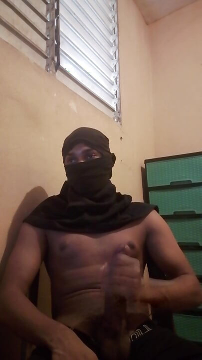 Masked big black cock masturbates